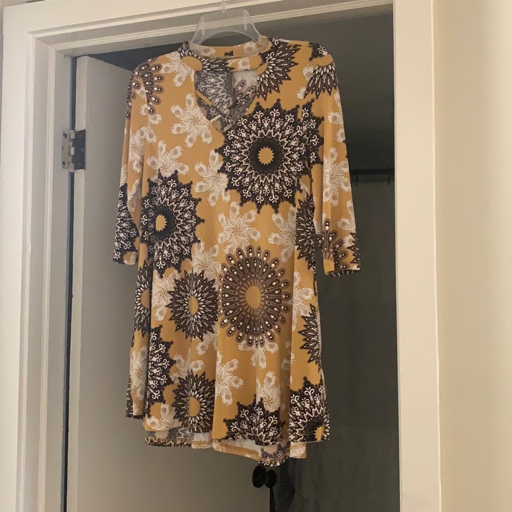 Beautiful soft mustard color dress.
